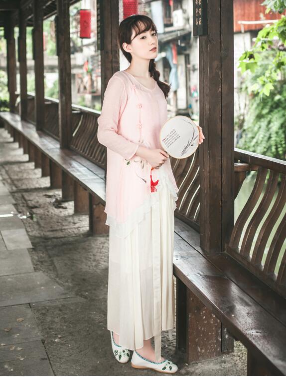 改良版復古家佳樂文學的漢服，簡約粉荷色漢服圖片